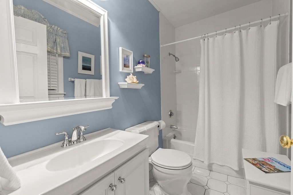 220 Perkins Row Topsfield, MA 01983 - Photo 14 of 42 a bathroom with a sink toilet and shower