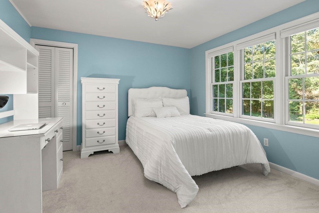 220 Perkins Row Topsfield, MA 01983 - Photo 16 of 42 a bedroom with a bed and a window