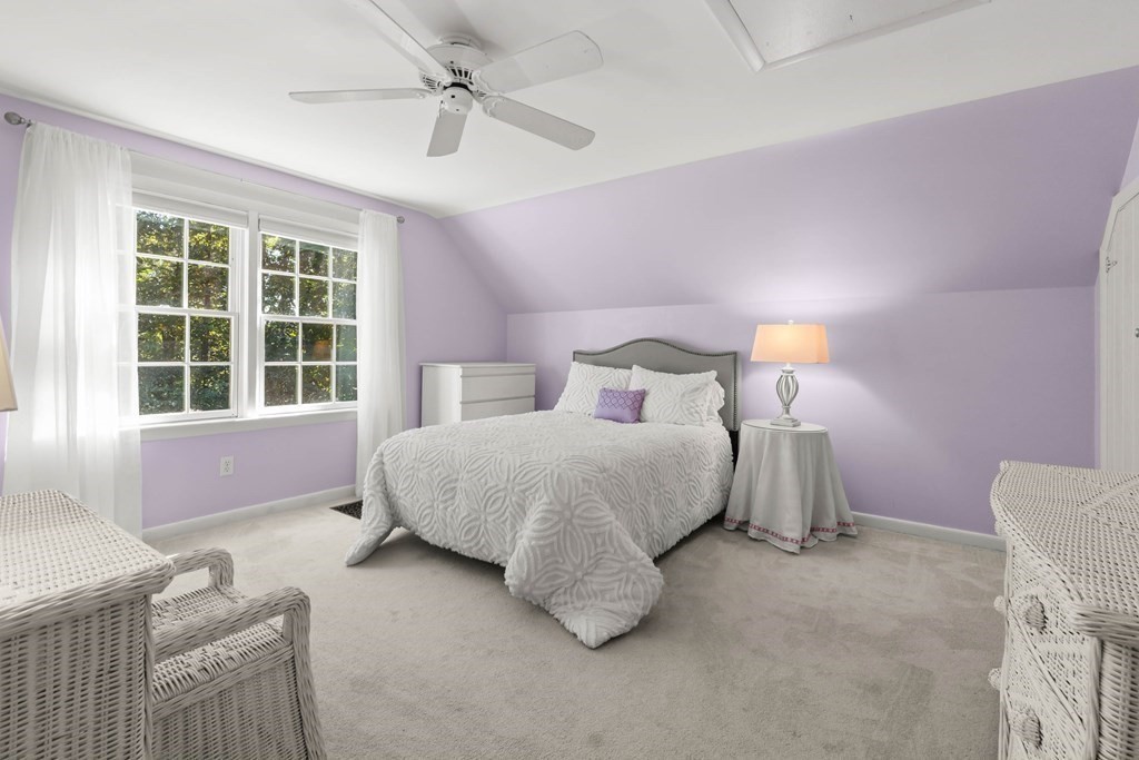 220 Perkins Row Topsfield, MA 01983 - Photo 17 of 42 a bedroom with a bed and a window