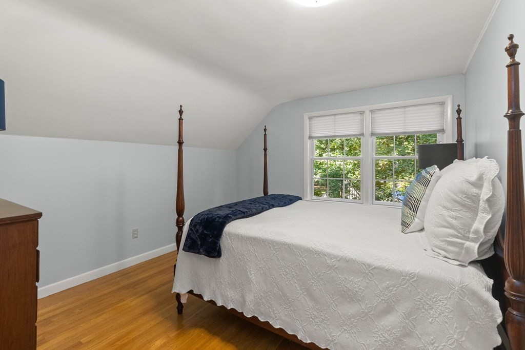 220 Perkins Row Topsfield, MA 01983 - Photo 20 of 42 a bedroom with a bed and a window