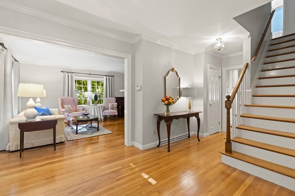 220 Perkins Row Topsfield, MA 01983 - Photo 3 of 42 a living room with furniture and a wooden floor