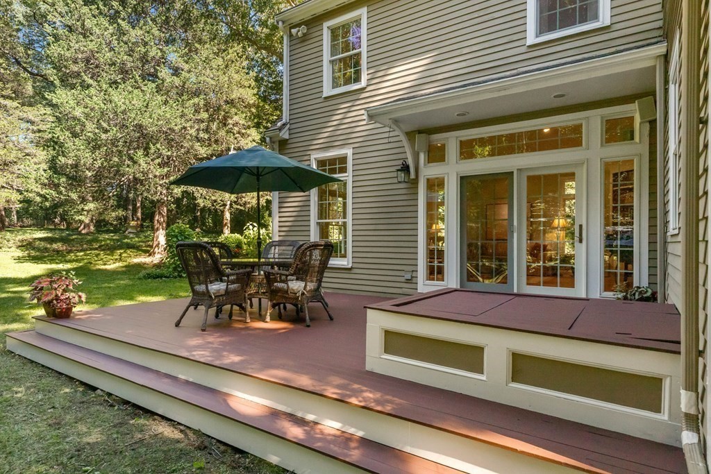 220 Perkins Row Topsfield, MA 01983 - Photo 31 of 42 a view of a house with a patio