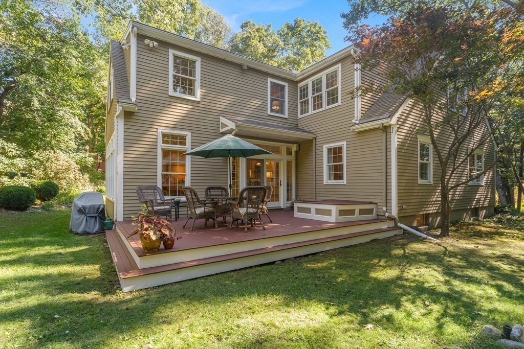 220 Perkins Row Topsfield, MA 01983 - Photo 32 of 42 a view of a house with backyard porch and sitting area