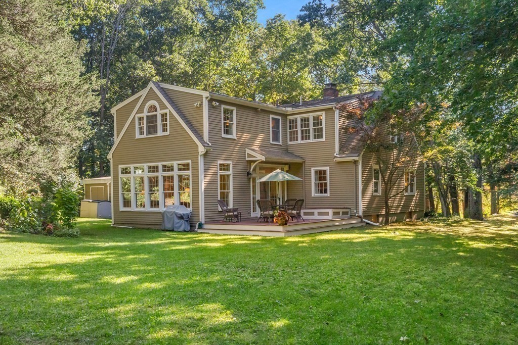 220 Perkins Row Topsfield, MA 01983 - Photo 33 of 42 a front view of a house with a yard