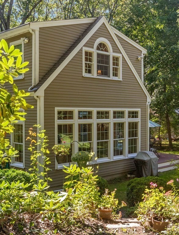 220 Perkins Row Topsfield, MA 01983 - Photo 35 of 42 a front view of a house with a yard