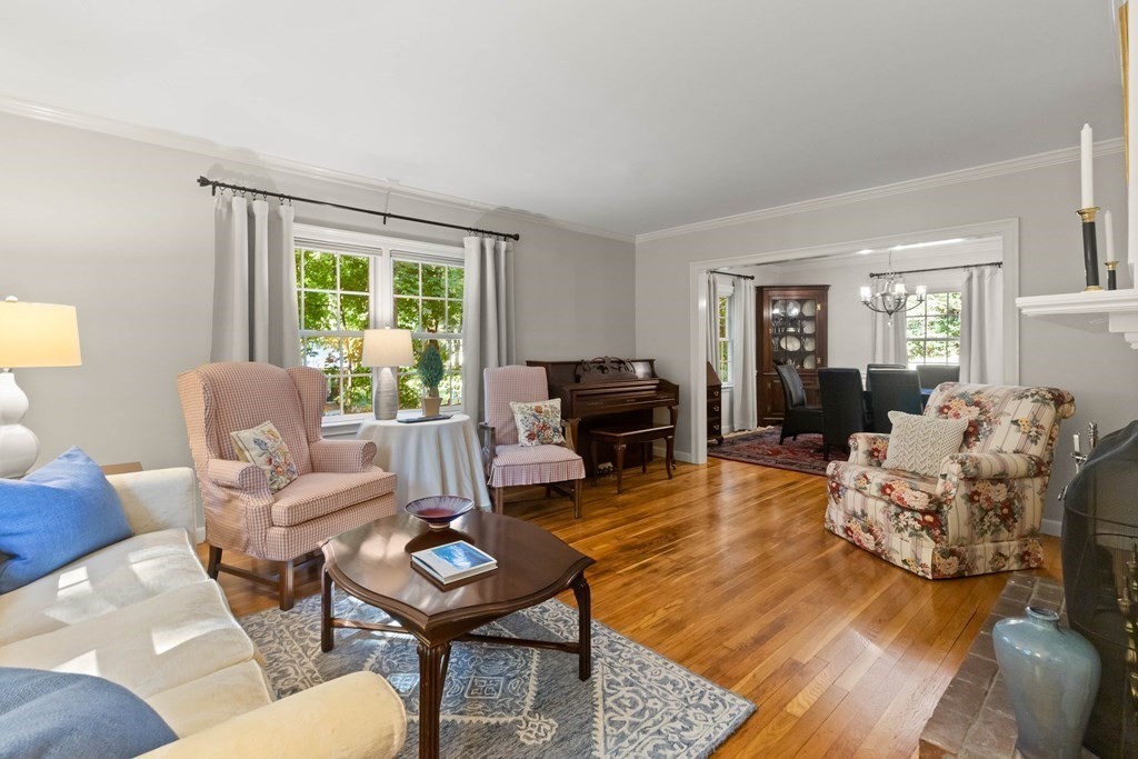 220 Perkins Row Topsfield, MA 01983 - Photo 4 of 42 a living room with furniture and a large window