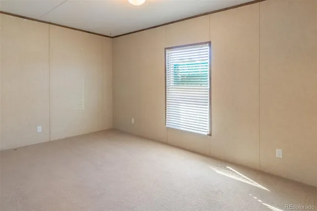 a view of a room that has a window in it