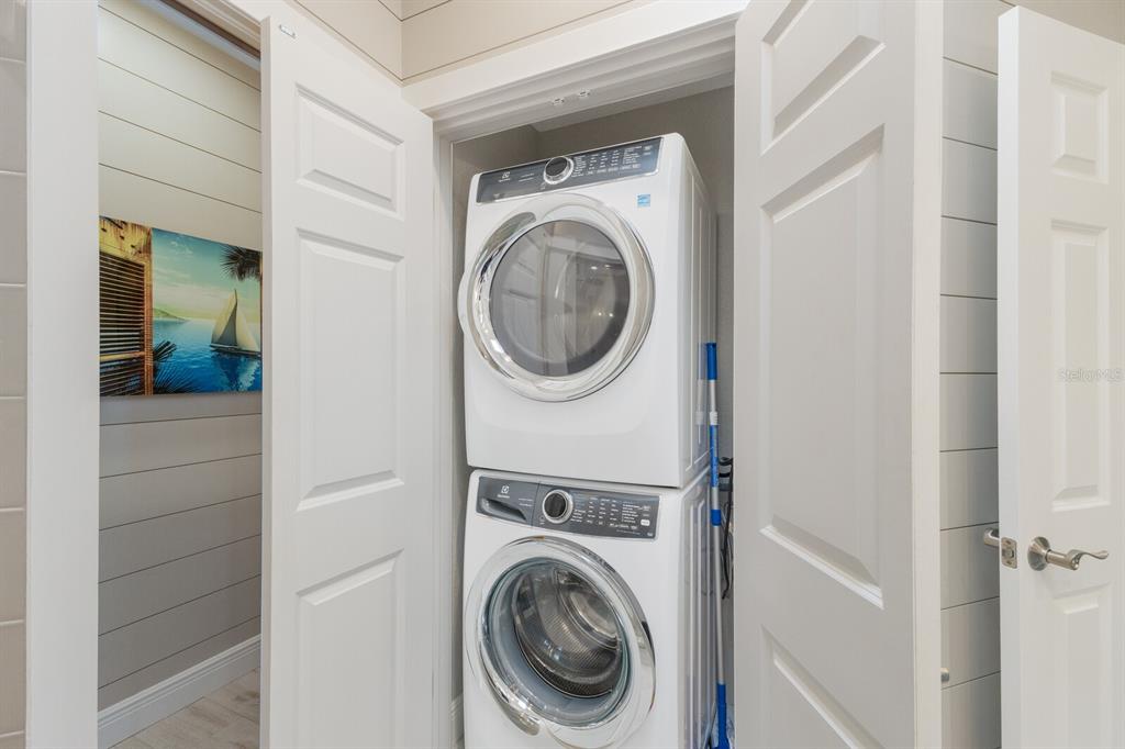799 Beach View Drive Boca Grande, FL 33921 - Photo 22 of 77 a utility room with dryer and washer