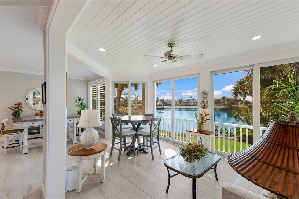 799 Beach View Drive Boca Grande, FL 33921 - Photo 5 of 77 a view of a dining room with furniture window and outside view