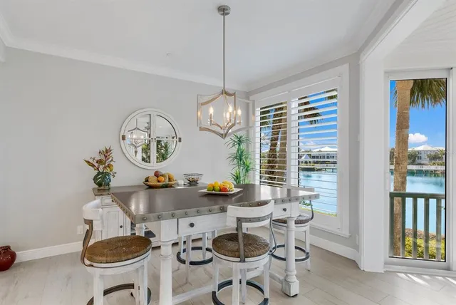 a kitchen with stainless steel appliances kitchen island granite countertop a sink and cabinets