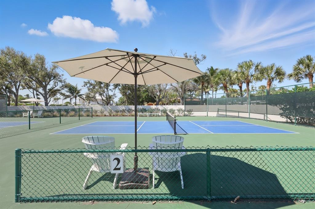 799 Beach View Drive Boca Grande, FL 33921 - Photo 76 of 77 a view of a swimming pool with a patio