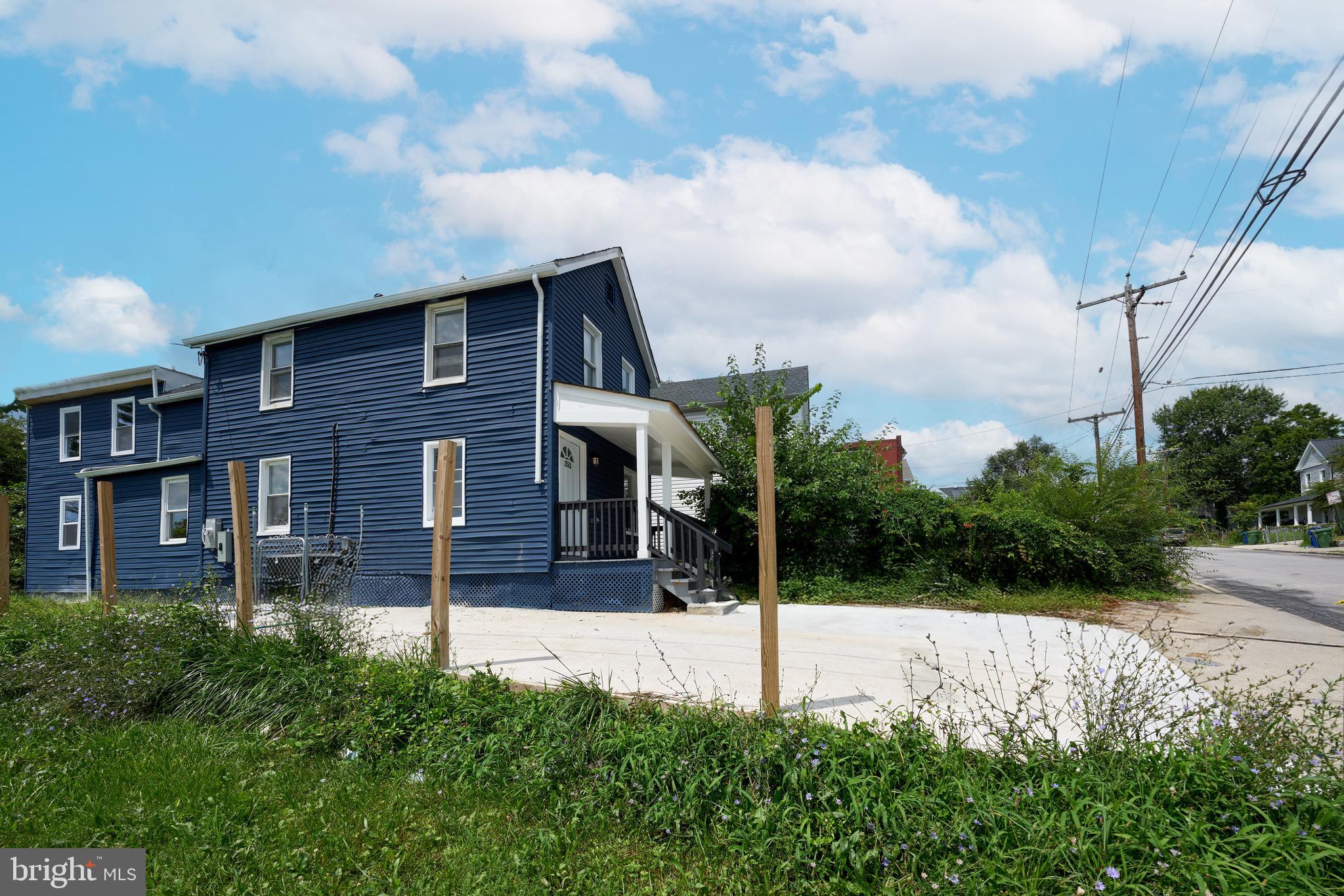 3511 Old Frederick Road Baltimore, MD 21229 - Photo 41 of 43 a backyard of a house with lots of green space