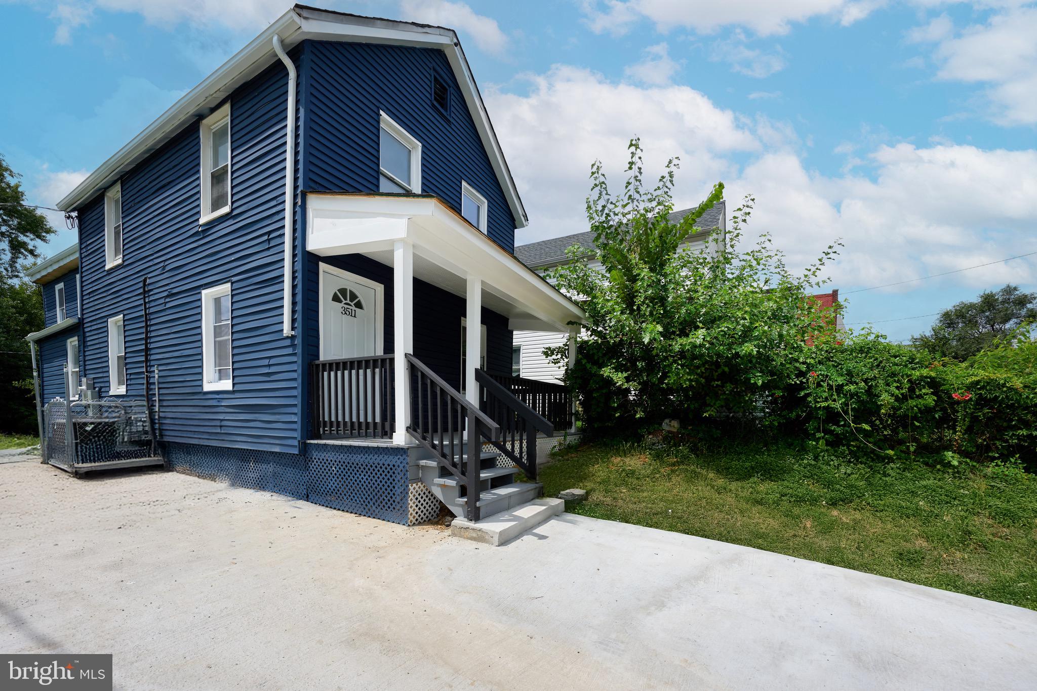 3511 Old Frederick Road Baltimore, MD 21229 - Photo 6 of 43 a view of a house with a yard