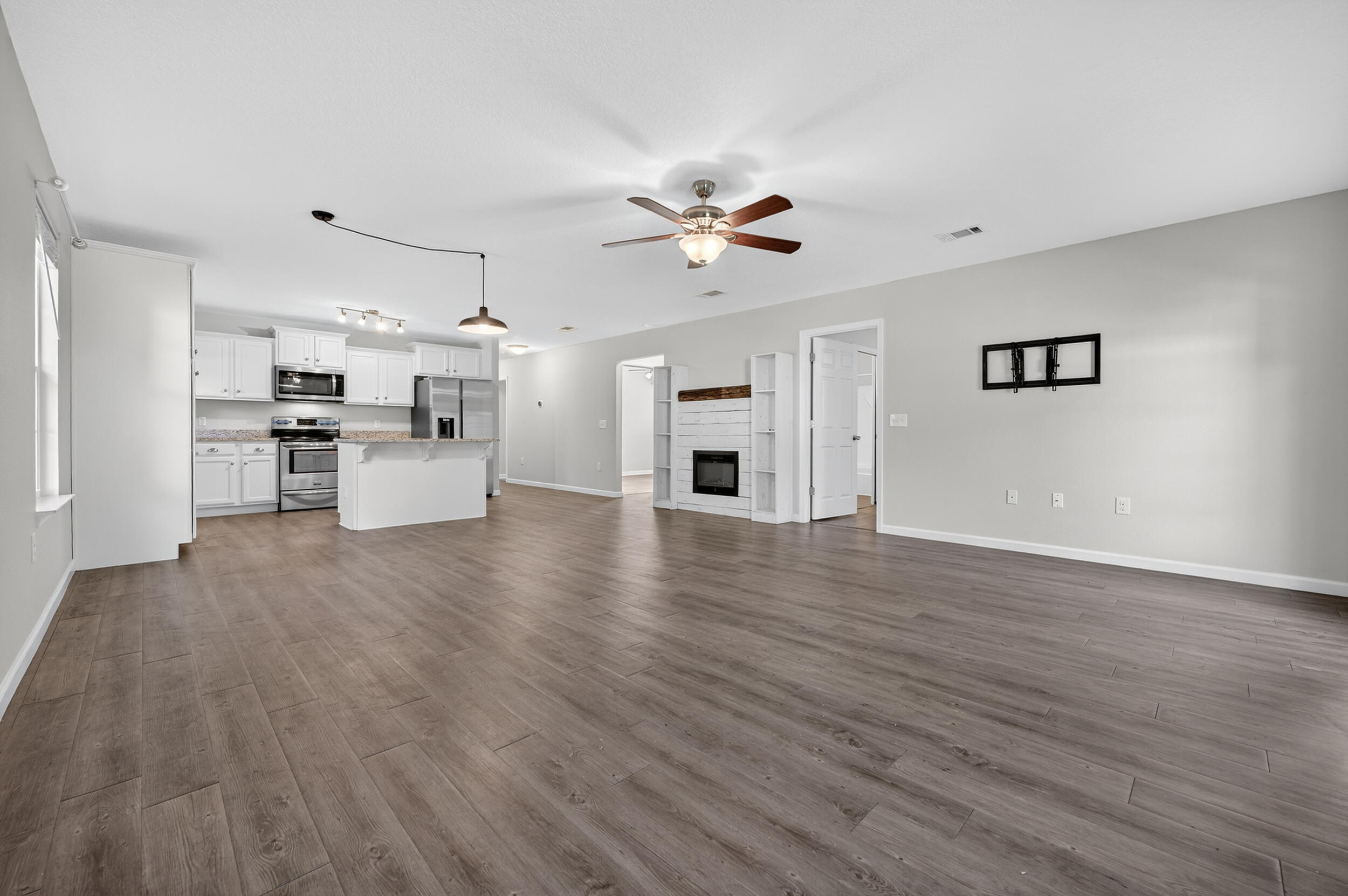 1833 Gainer Avenue Baker, FL 32531 - Photo 14 of 43 a view of a kitchen with a sink and a stove top oven