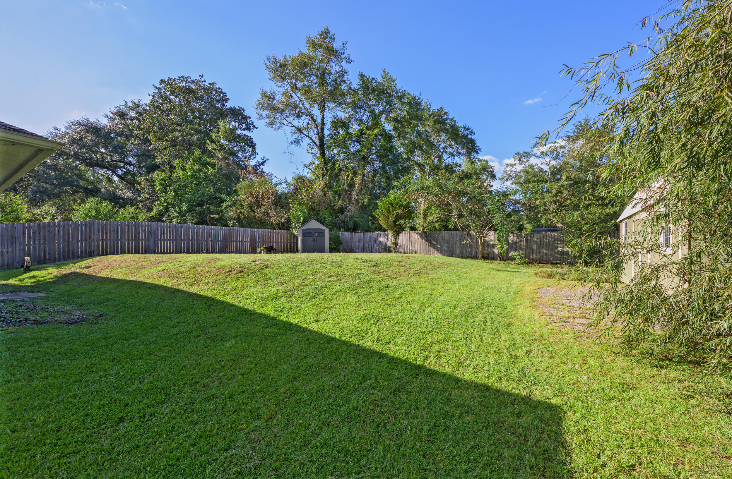 1833 Gainer Avenue Baker, FL 32531 - Photo 38 of 43 a view of swimming pool with a garden