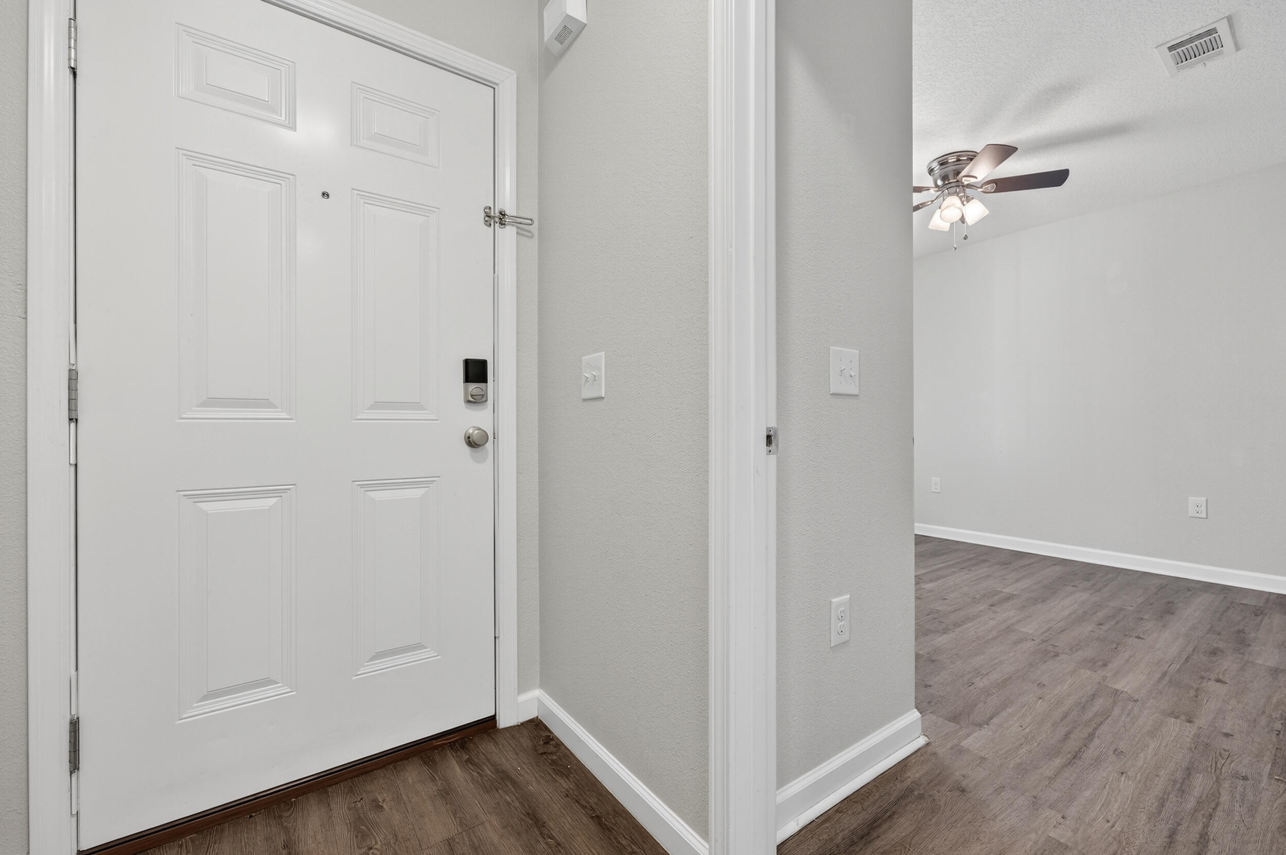 1833 Gainer Avenue Baker, FL 32531 - Photo 4 of 43 a view of empty room with wooden floor