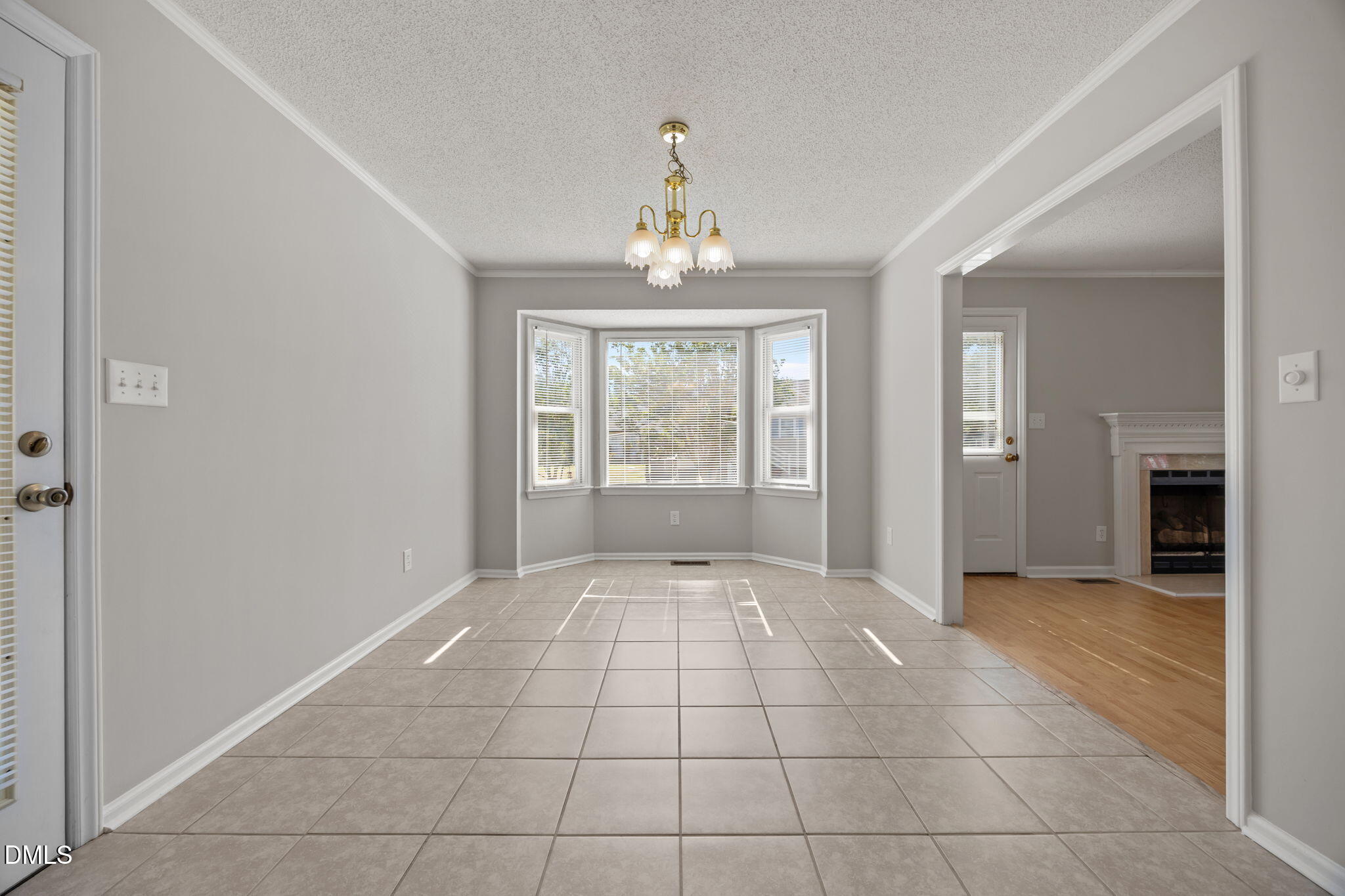 40 Circle Tree Lane Angier, NC 27501 - Photo 9 of 39 wooden floor in an empty room with a window