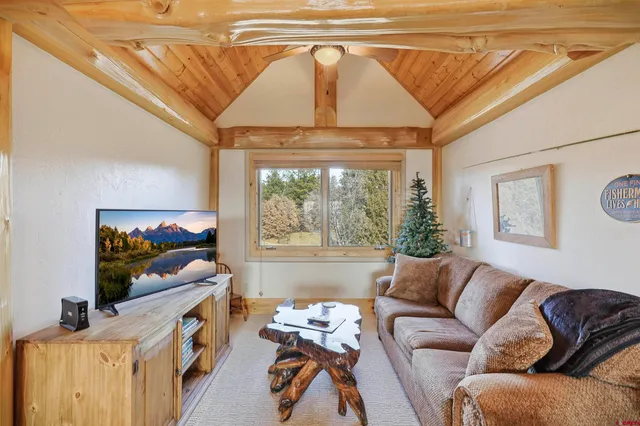 a very nice looking room with a large tree