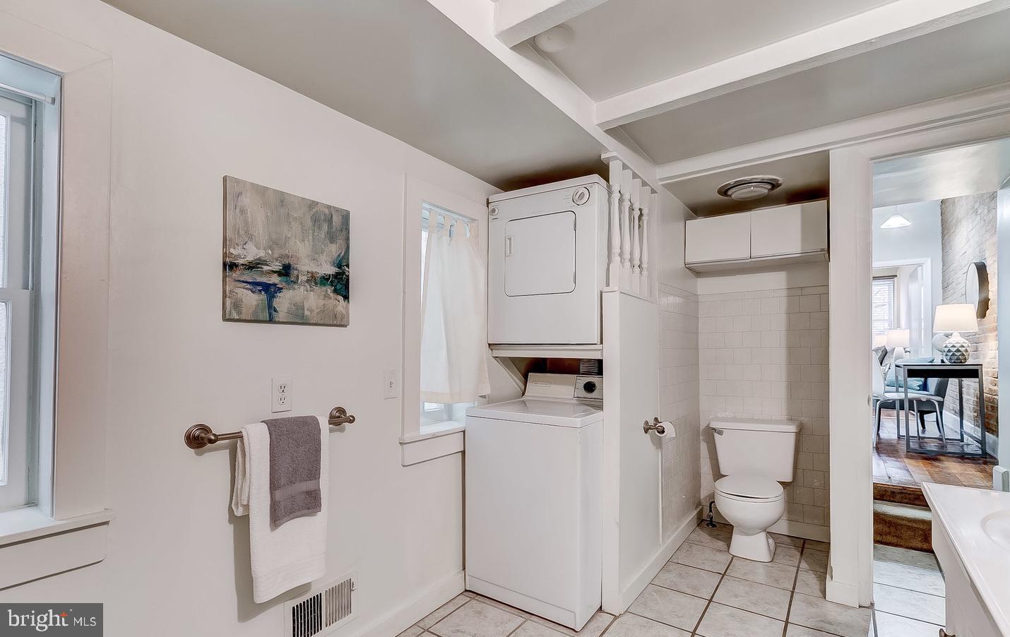 825 South Charles Street Baltimore, MD 21230 - Photo 20 of 34 a bathroom with a toilet sink and a shower