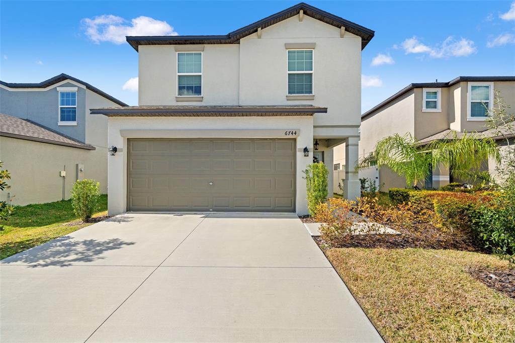 6744 Back Forty Loop Zephyrhills, FL 33541 - Photo 2 of 56