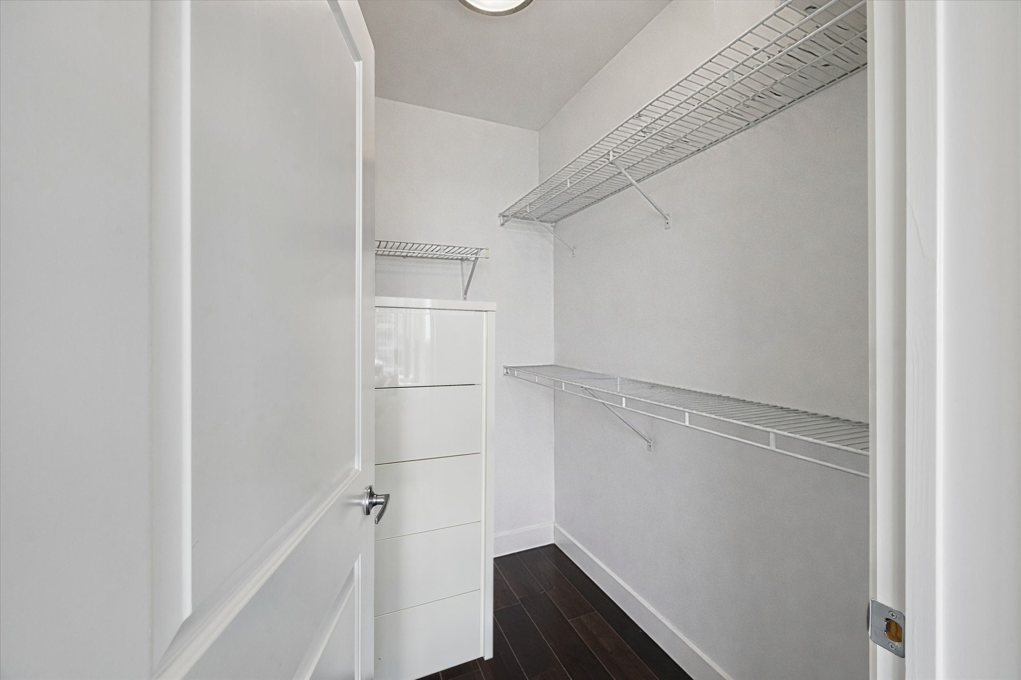 5925 Almeda Road, Unit 11218 Houston, TX 77004 - Photo 13 of 39 a view of walk in closet with empty racks