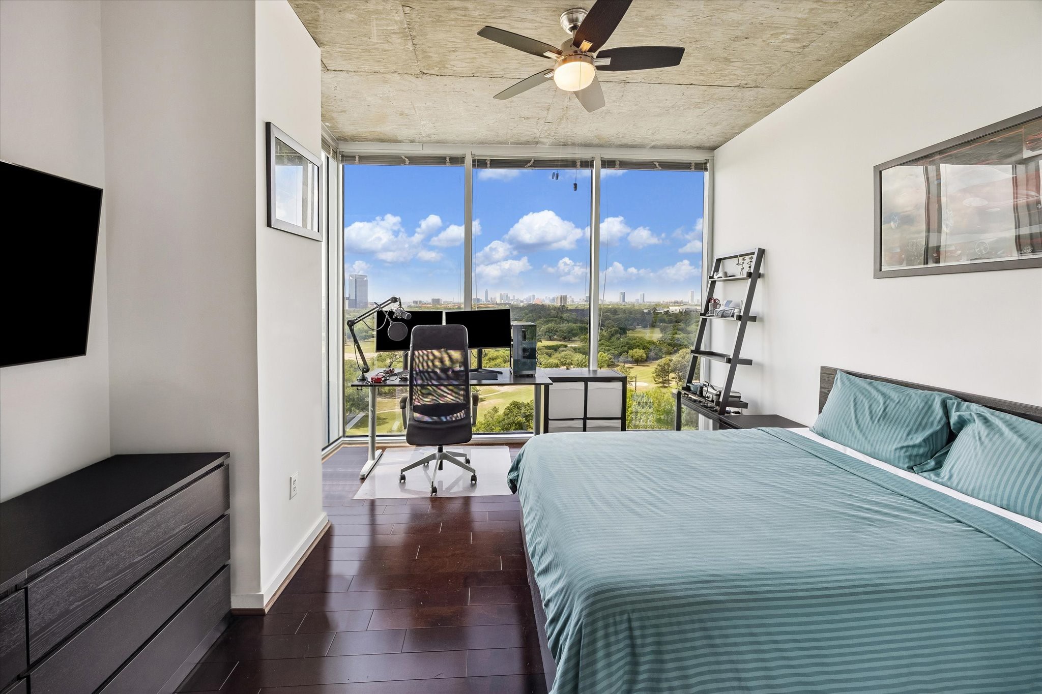 5925 Almeda Road, Unit 11218 Houston, TX 77004 - Photo 15 of 39 a view of a livingroom with furniture window and wooden floor