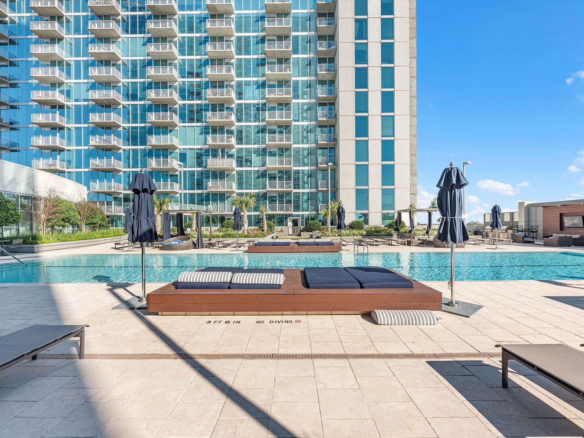 5925 Almeda Road, Unit 11218 Houston, TX 77004 - Photo 21 of 39 a view of a swimming pool with a patio