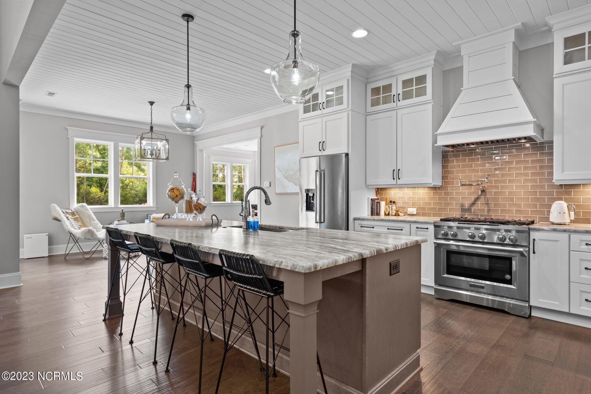448 Whitebridge Road Hampstead, NC 28443 - Photo 15 of 139 Shiplap Ceiling in Kitchen and Breakfast Nook