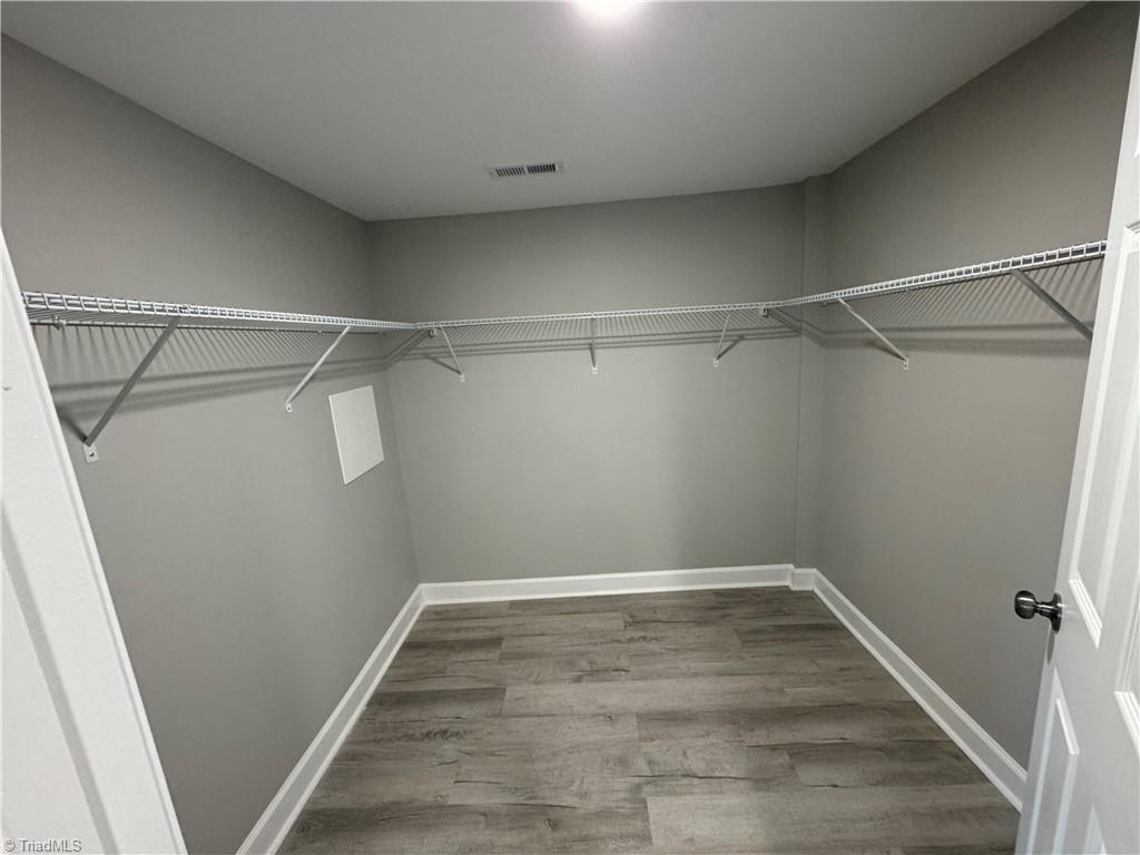 5515 Bethania Road Pfafftown, NC 27040 - Photo 24 of 49 Walk in closet in primary suite