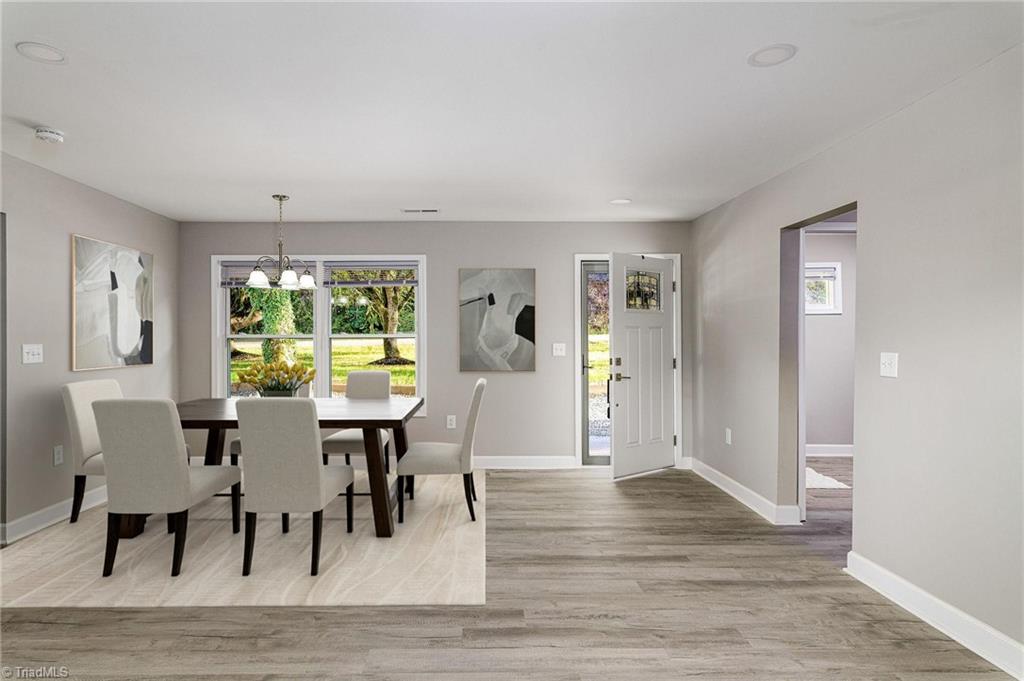 5515 Bethania Road Pfafftown, NC 27040 - Photo 9 of 49 Staged dining area near front door