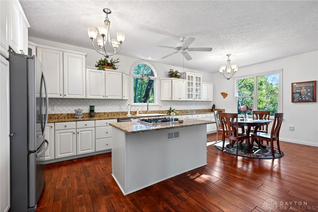 330 South Alpha Bellbrook Road Bellbrook, OH 45305 - Photo 20 of 87 This spacious kitchen offers ample counter space and an inviting dining area.