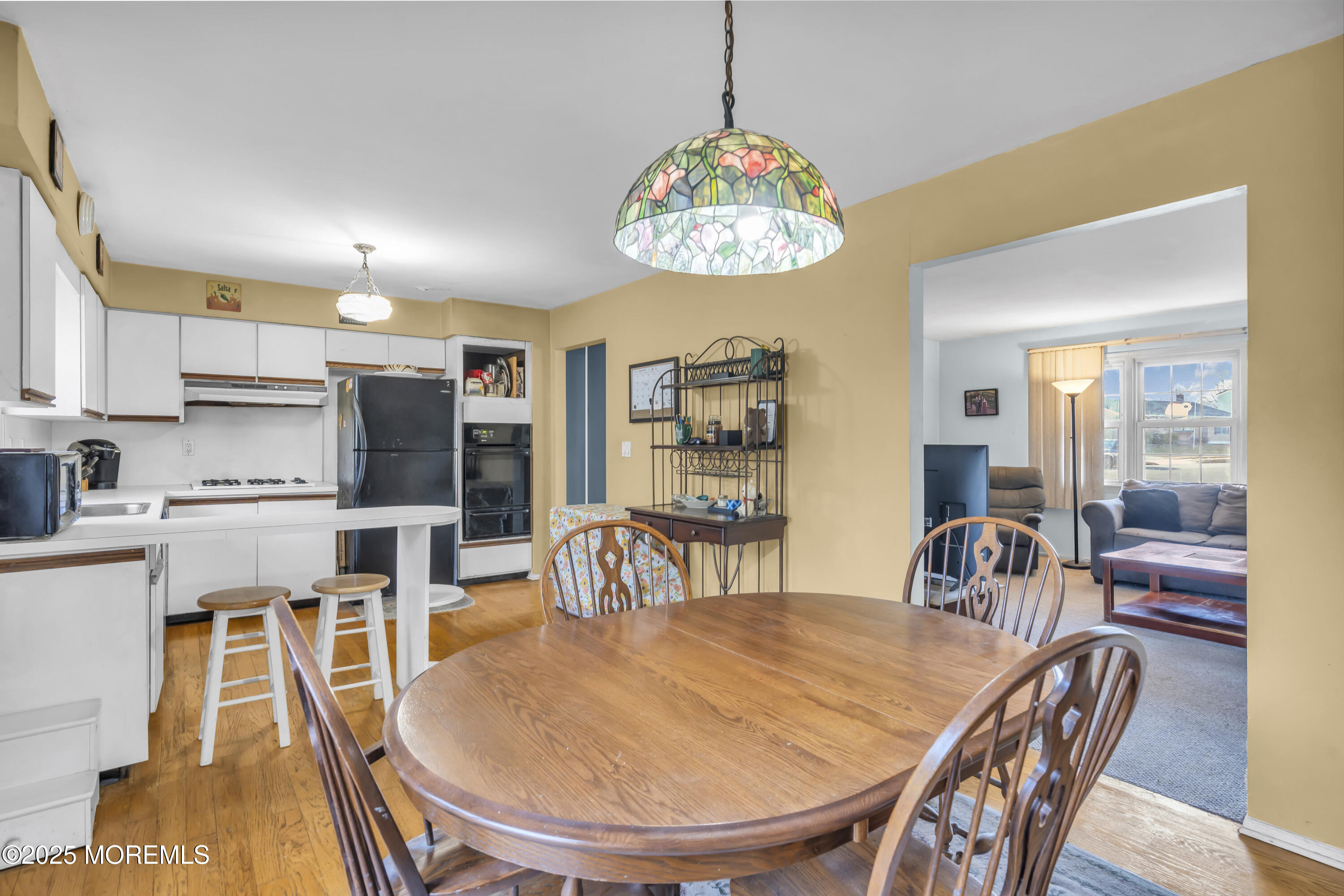7 Whalepond Road Oakhurst, NJ 07755 - Photo 16 of 23 a view of a dining room with furniture