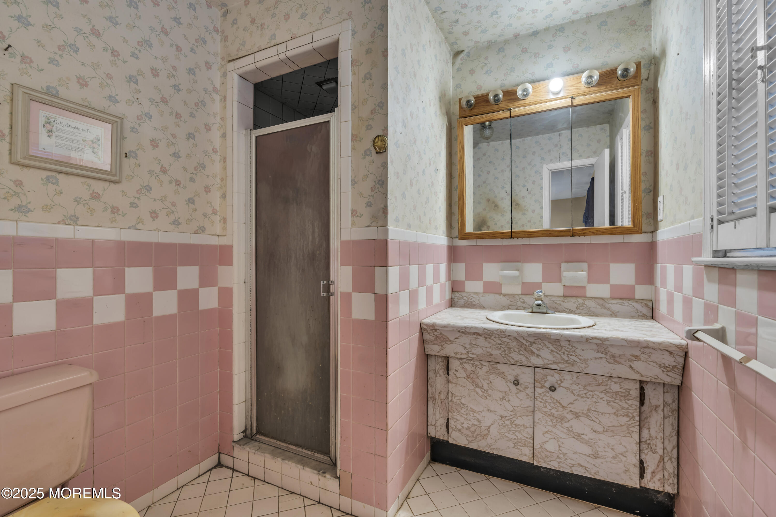 7 Whalepond Road Oakhurst, NJ 07755 - Photo 21 of 23 a bathroom with a granite countertop sink toilet and shower