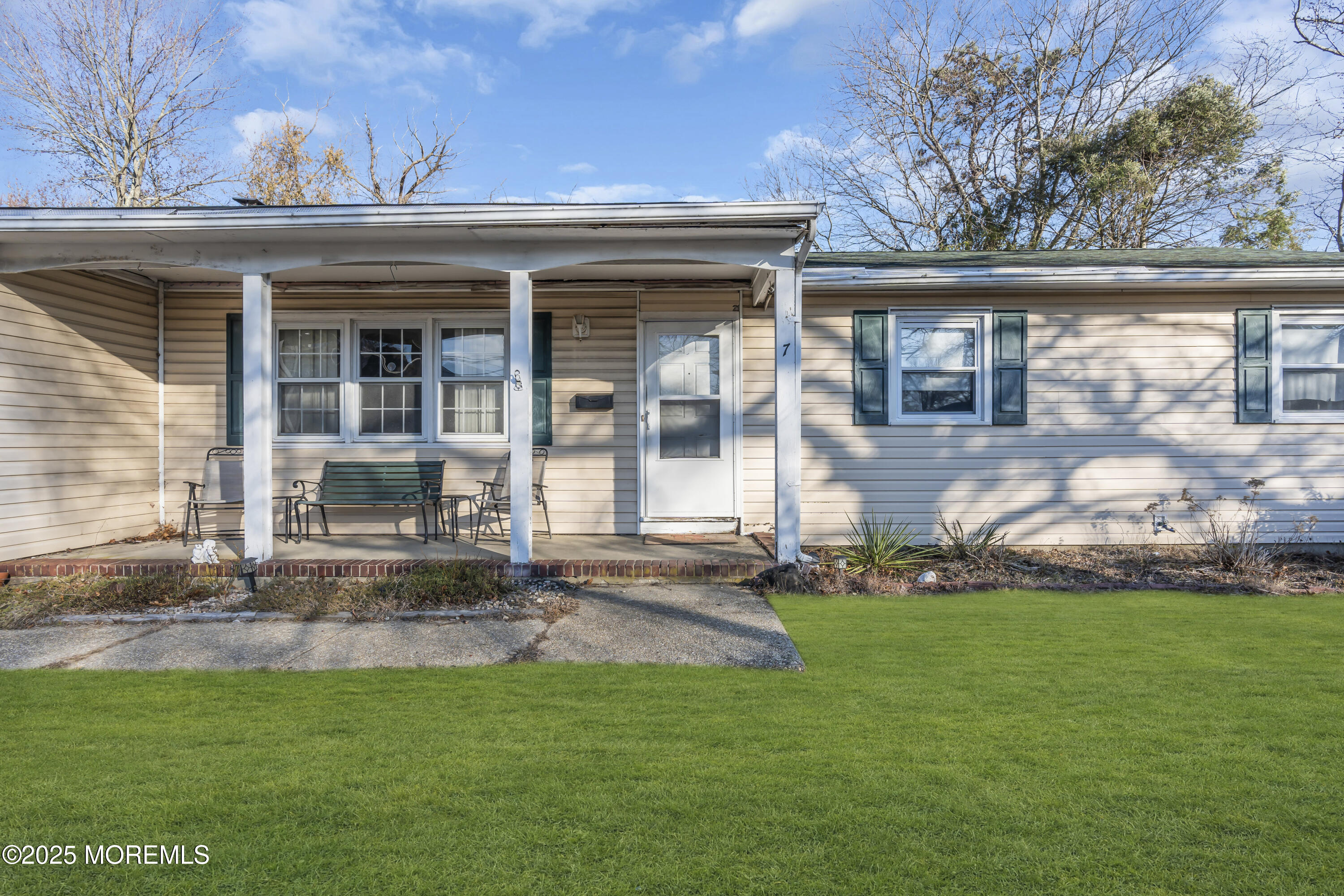 7 Whalepond Road Oakhurst, NJ 07755 - Photo 4 of 23 front view of house with a yard
