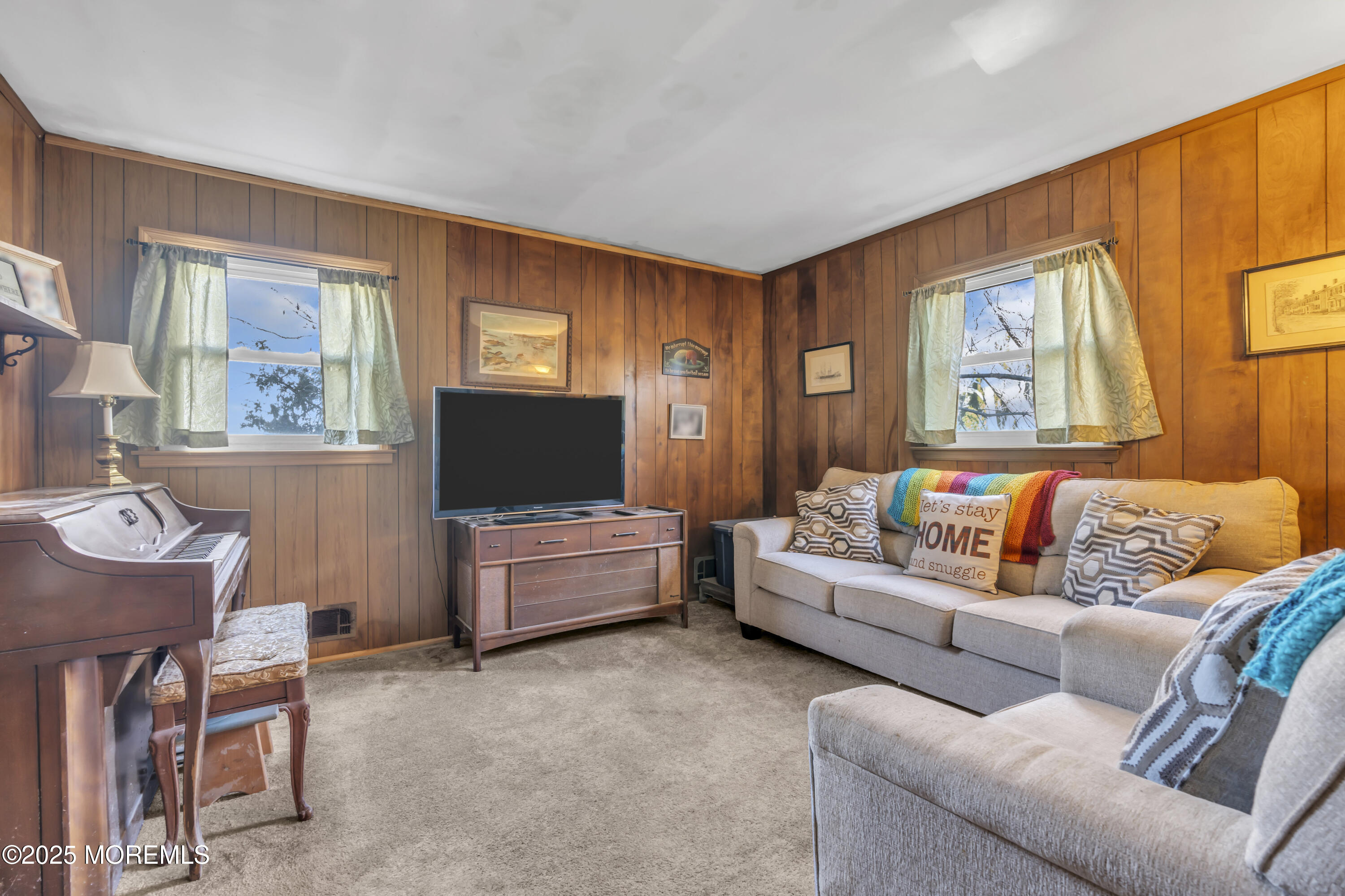 7 Whalepond Road Oakhurst, NJ 07755 - Photo 5 of 23 a living room with furniture and a flat screen tv