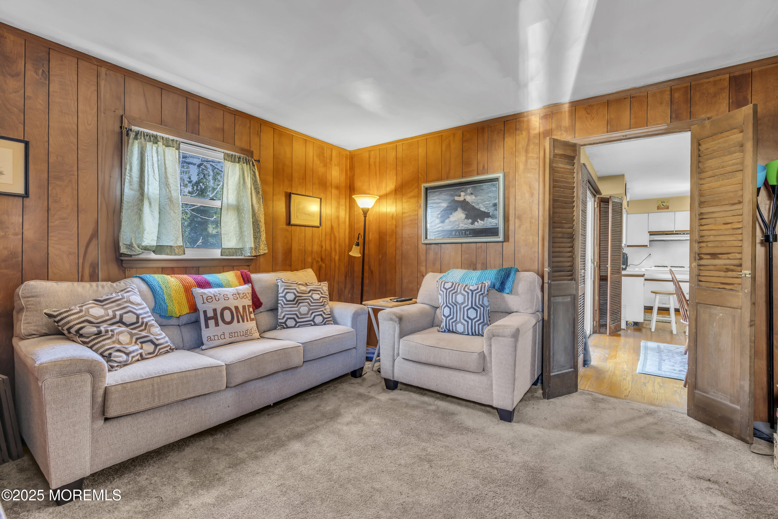 7 Whalepond Road Oakhurst, NJ 07755 - Photo 6 of 23 a living room with furniture and a large window