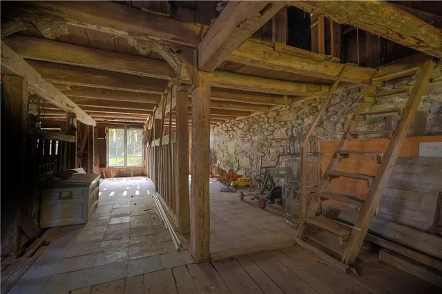 a view of a porch with wooden floor