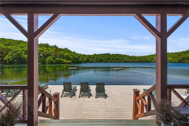 a view of a lake from a balcony