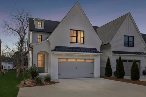 a view of a house with a garage