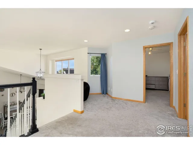 a view of a hallway with workspace