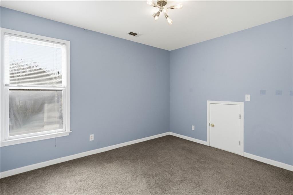 201 Arbor Hills Road North Talking Rock, GA 30175 - Photo 21 of 46 an empty room with a window