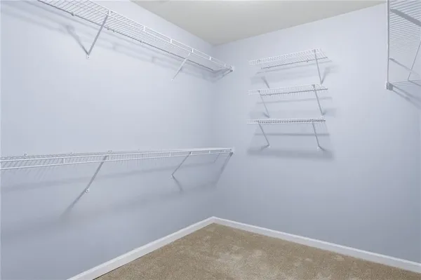 a view of a room with racks on the wall