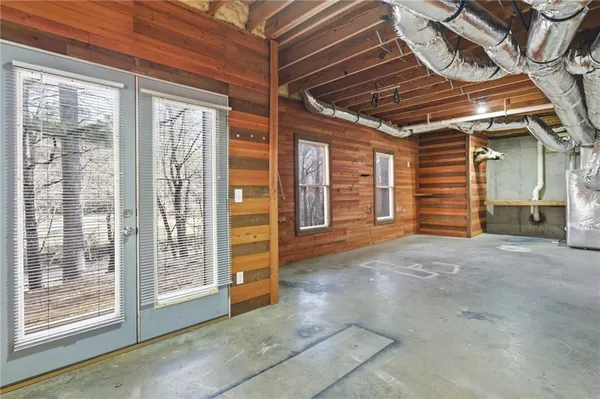 a view of an empty room with a balcony