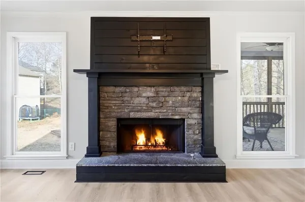 a living room with a fireplace