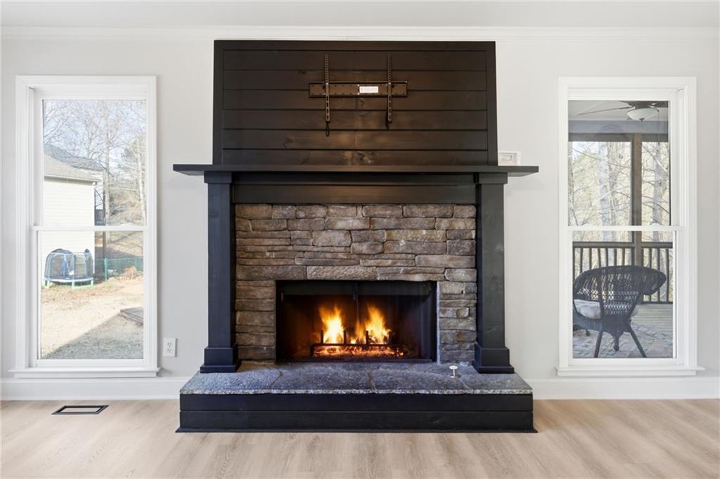 201 Arbor Hills Road North Talking Rock, GA 30175 - Photo 7 of 46 a living room with a fireplace