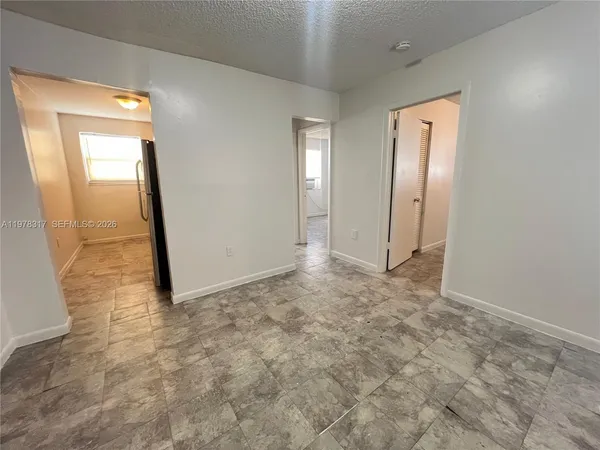 an empty room with a workbench