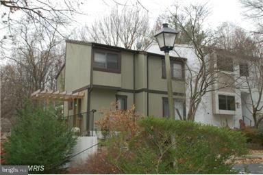 2335 Millennium Lane Reston, VA 20191 - Photo 1 of 18 a front view of a house with garden