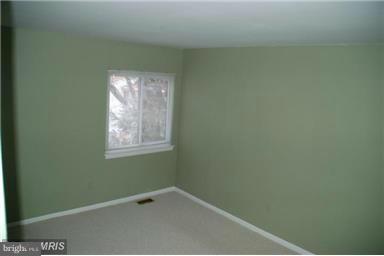 2335 Millennium Lane Reston, VA 20191 - Photo 11 of 18 a view of an empty room with a window