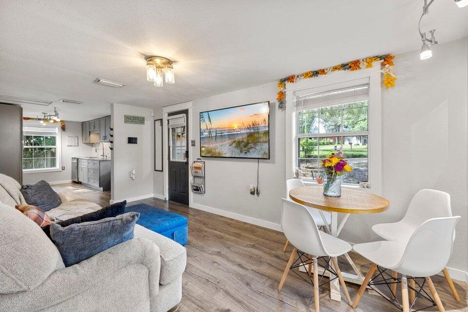 101 3rd Street Niceville, FL 32578 - Photo 6 of 16 a living room with furniture and a breakfast area