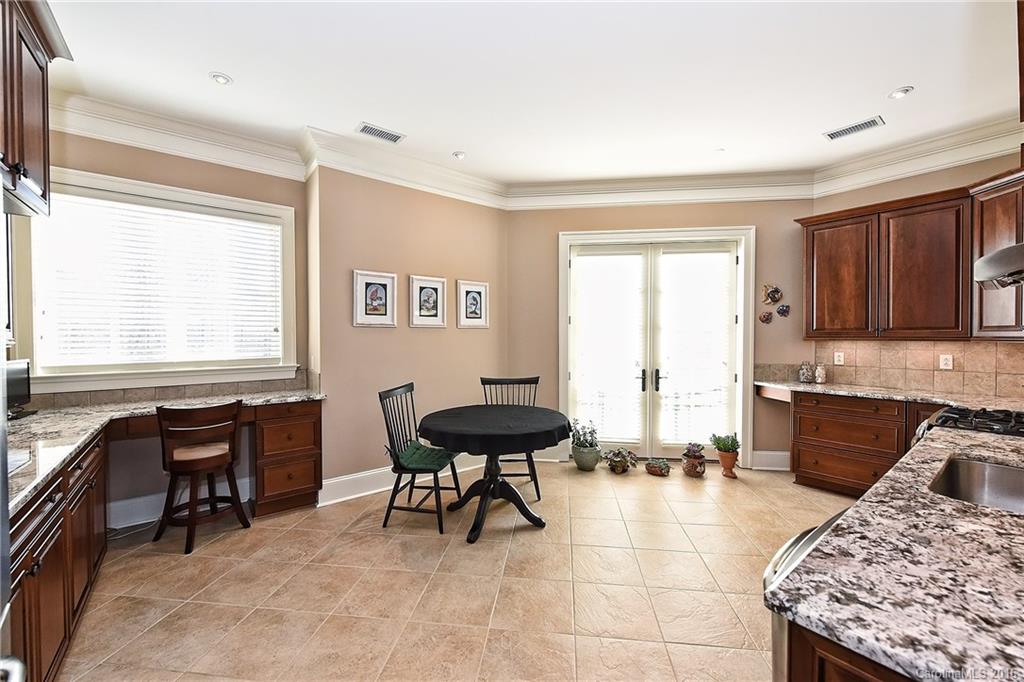 2823 Providence Road, Unit 228 Charlotte, NC 28211 - Photo 12 of 24 a room with furniture a bed and a window